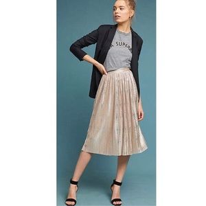 Anthropologie cassia shine midi skirt in gold.